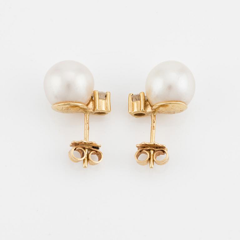 Earrings, a pair, with cultured pearls and brilliant-cut diamonds.