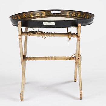 A tole-peinte Empire tray, first part 19th century on a later stand.