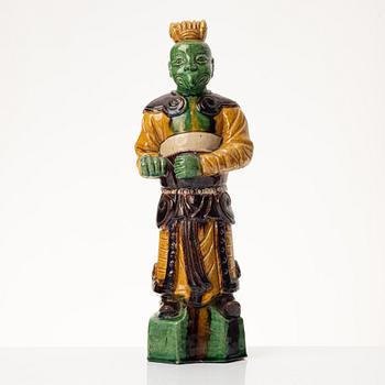 A stoneware figurine, China, Ming style but 20th century.