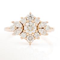 Ring in 14K rose gold in the form of a flower set with brilliant-cut and marquise-cut diamonds.