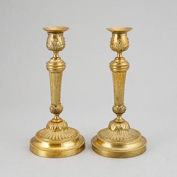 A pair of Louis XVI-style candlesticks, ca 1900.