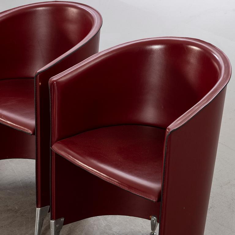 A pair of late 20th century armchairs.