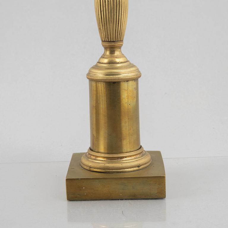 A pair of brass candelabra, first half/mid 19th century.