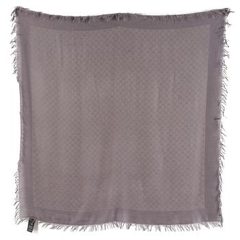 A shawl by Gucci.