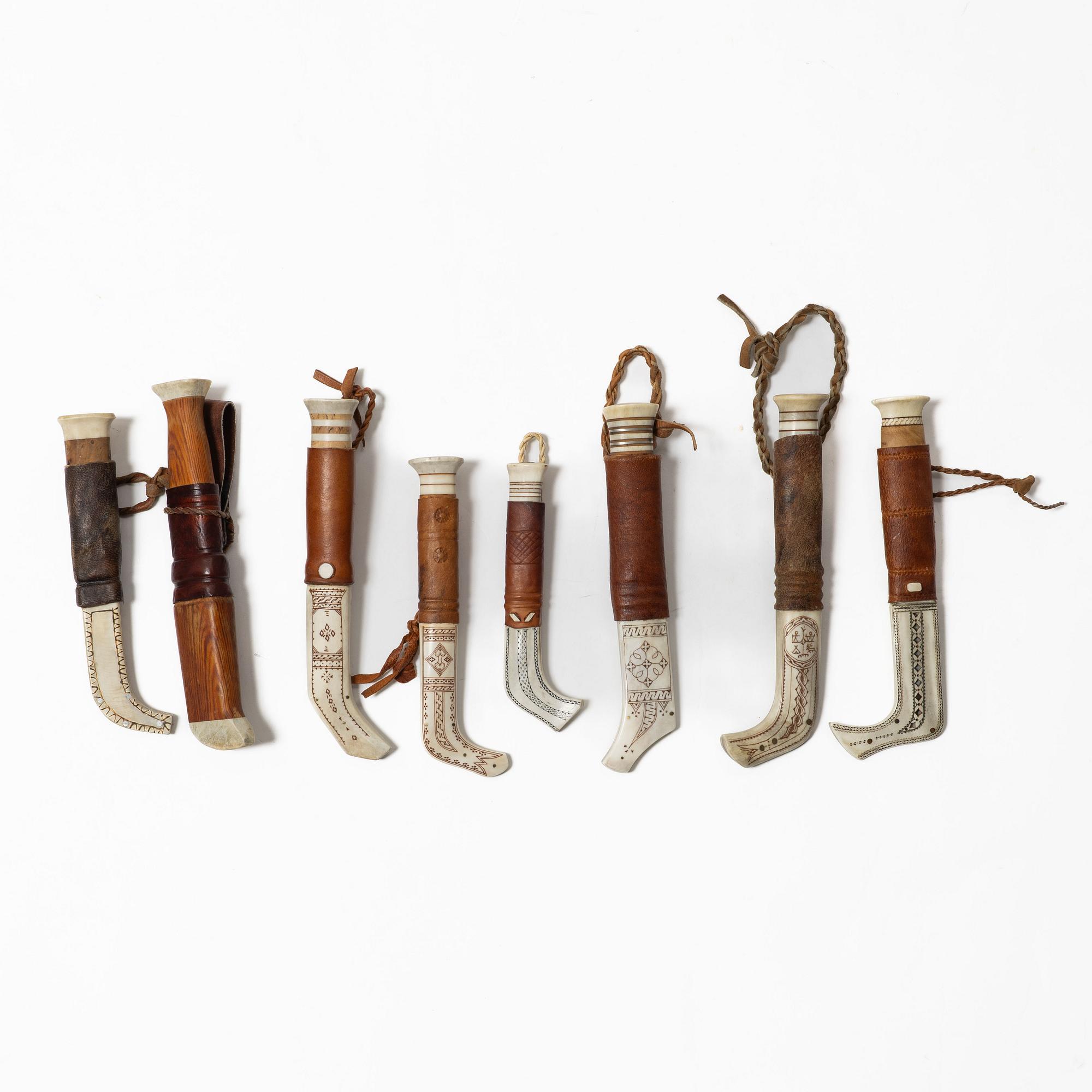 Eight knives, of which seven are half-horn knives, signed.