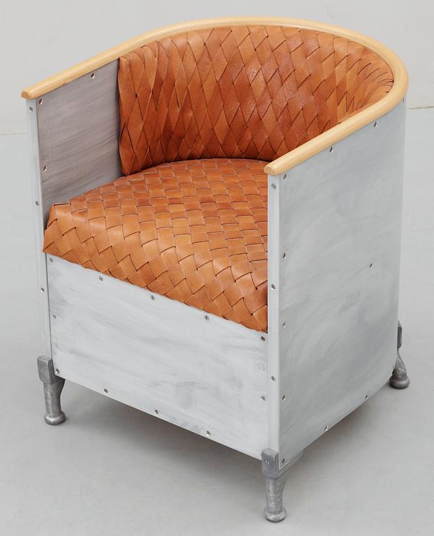 A Mats Theselius 'Aluminium' leather and aluminium easy chair, by Källemo, Sweden circa 1990.