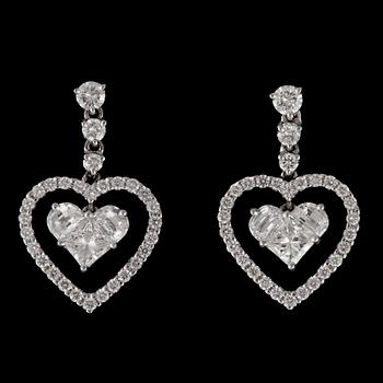 1087. A pair of brilliant-cut diamond earrings, 2.26 cts in total.