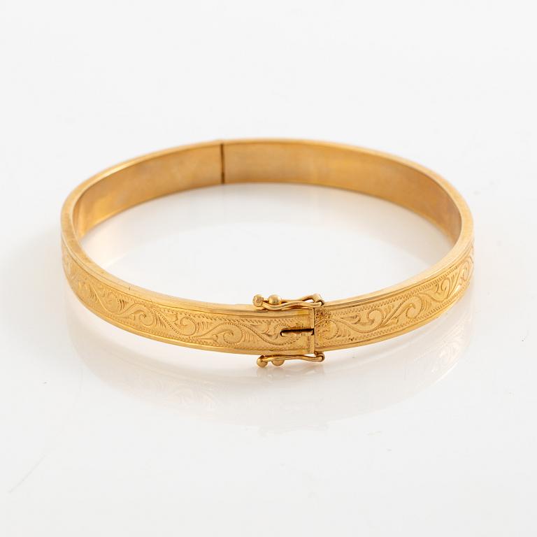 Arm ring, 18K gold.