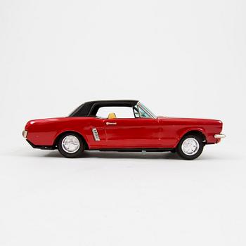 A Bandai tinplate "Ford Mustang with slip action", Japan, 1960s.