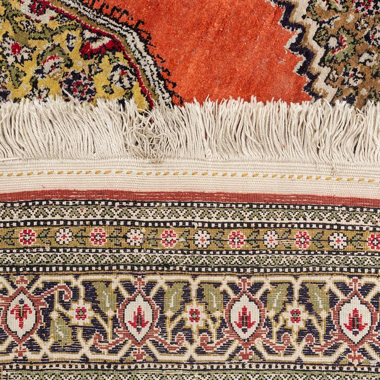 A rug, silk Qum, ca 174 x 104 cm.