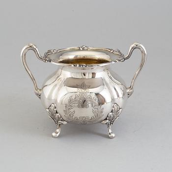 A 3 part silver coffee service dated 1937.