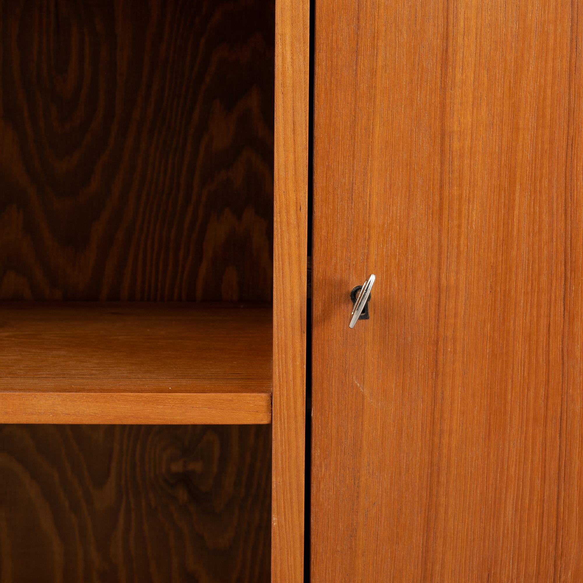 A teak book case. Second half of the 20th Century.