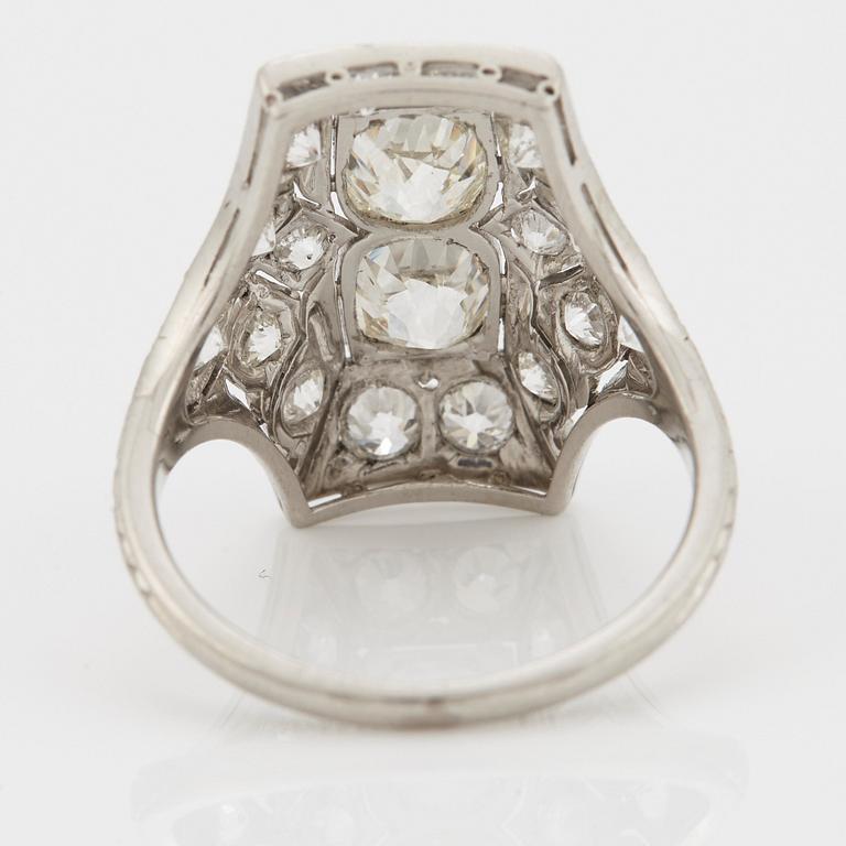 A RING set with old-cut diamonds.