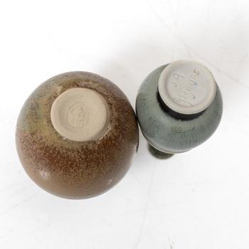 A set of fourteen stoneware vases and ten bowls, predominantly John Andersson, Höganäs.