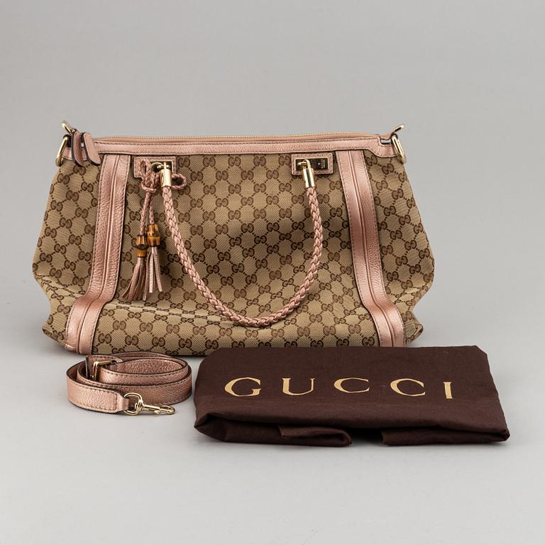 Gucci, a monogram canvas bag.