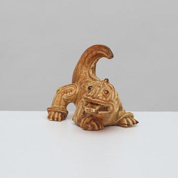 A Wilhelm Kåge stoneware figure of a dragon puppy, Gustavsberg 1940's.