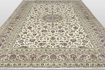 A Keshan carpet, c. 355 x 243 cm.