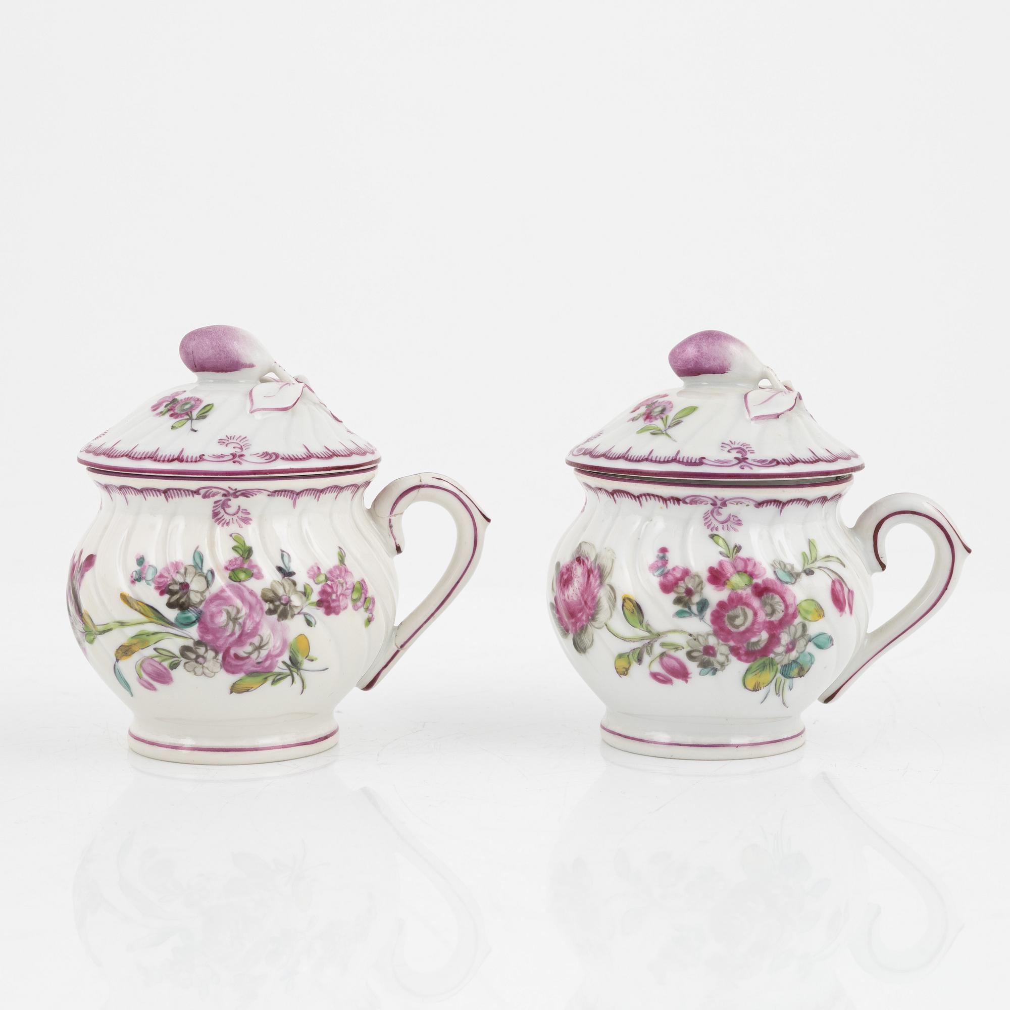 Seven porcelain cream cups, Höchst-like mark, first half of the 20th century.