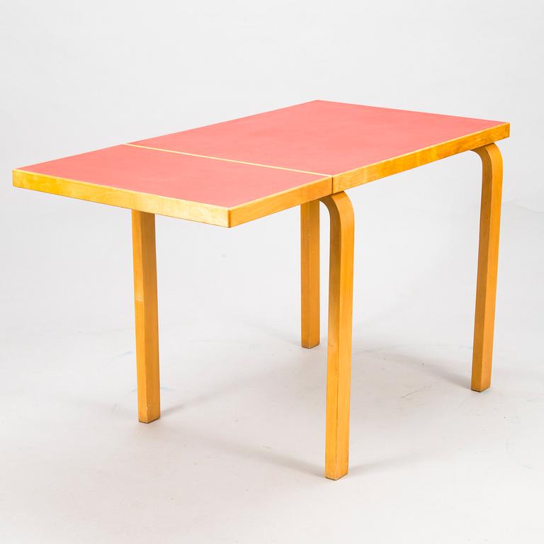 A mid-20th century drop leaf table for Artek Finland.