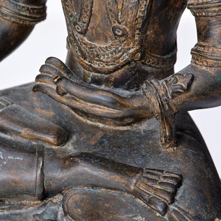 A Burmese bronze figure of a crowned buddha, 18th Century or older.