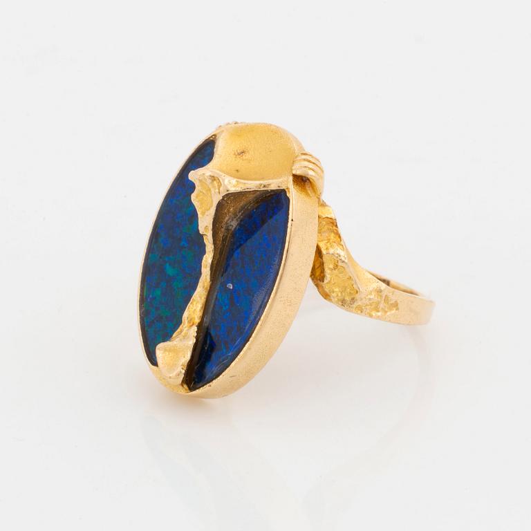 A Lapponia ring design Björn Weckström in 18K gold set with an opal.