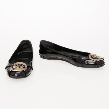A Pair of Black Leather Ballerinas, size 40.