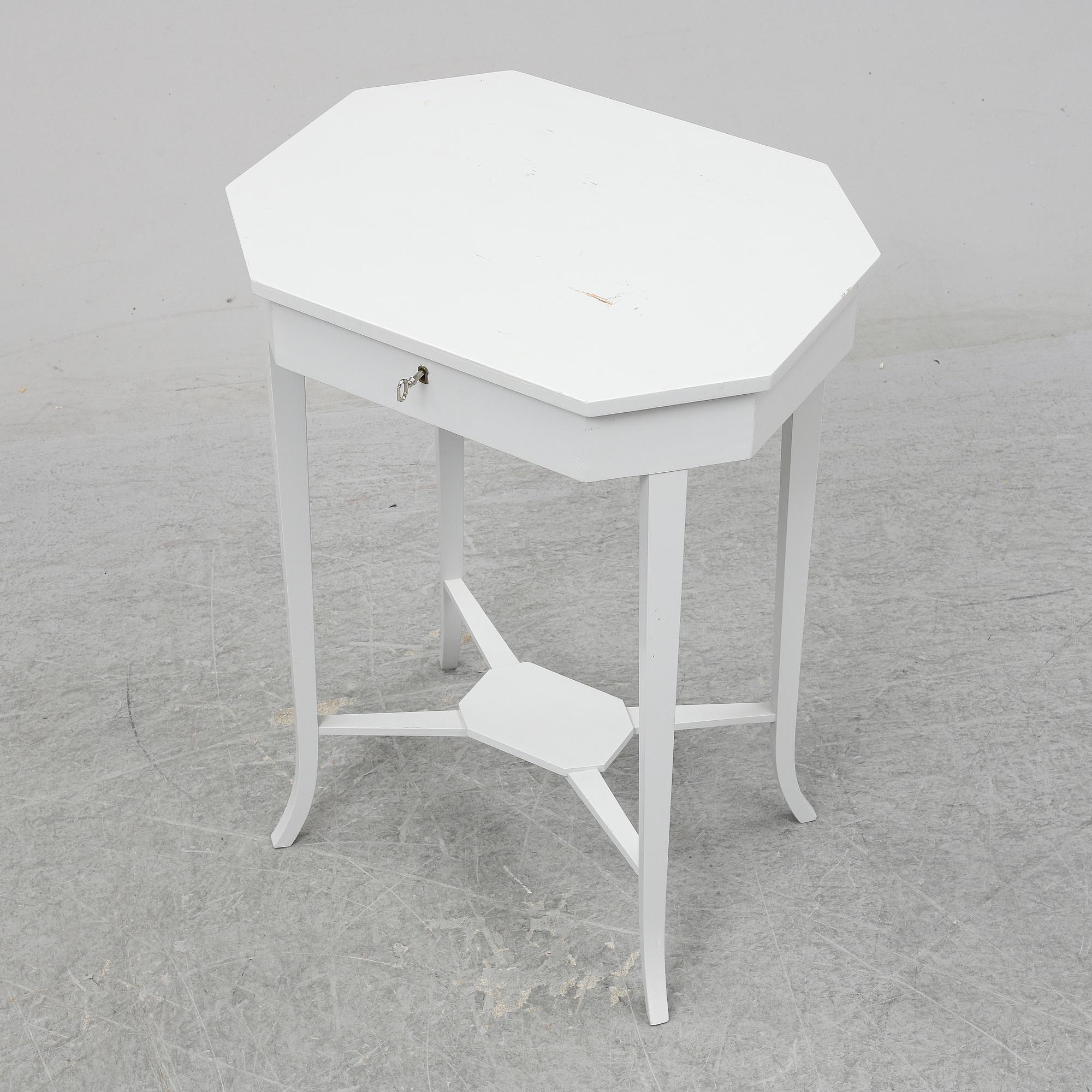 A ladys working table 20 th century.