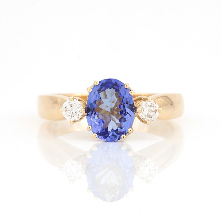 RING, med tanzanit ca 1.44 ct och briljantslipade diamanter totalt ca 0.25 ct.