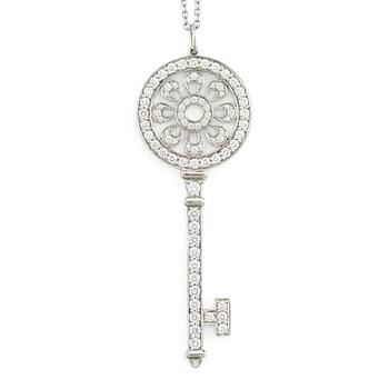 A platinum "Tiffany Keys" pendant set with round brilliant-cut diamonds.