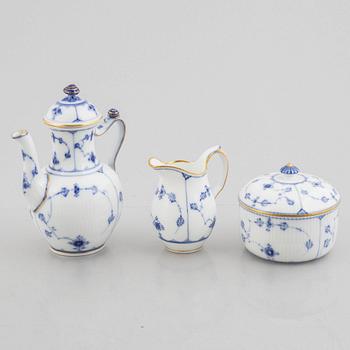 A "Blue fluted"/"Musselmalet riflet" porcelain mocha pot, a sugar box with cover and a creamer, Royal Copenhagen, 19th c.