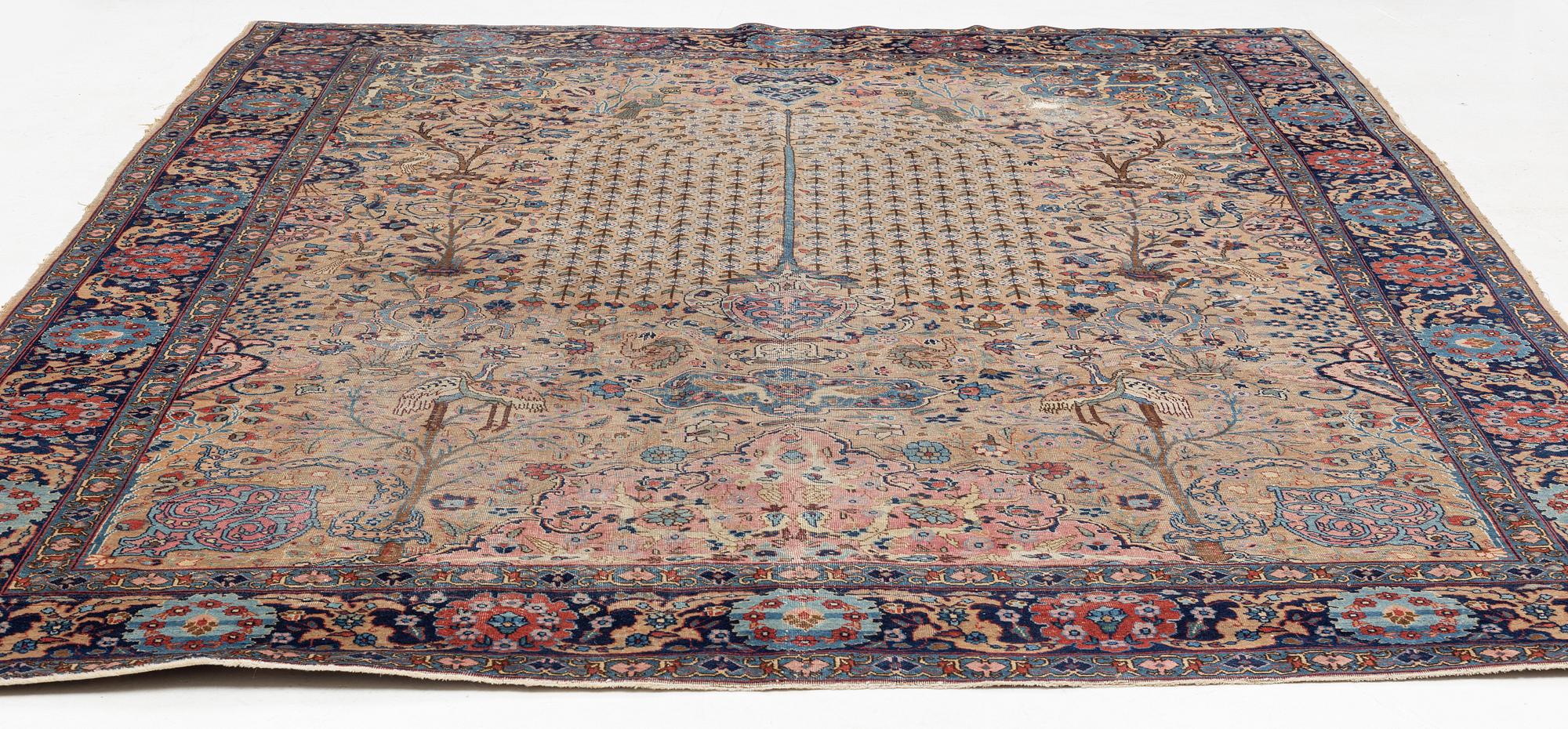 An oriental carpet, circa 350 x 295 cm.