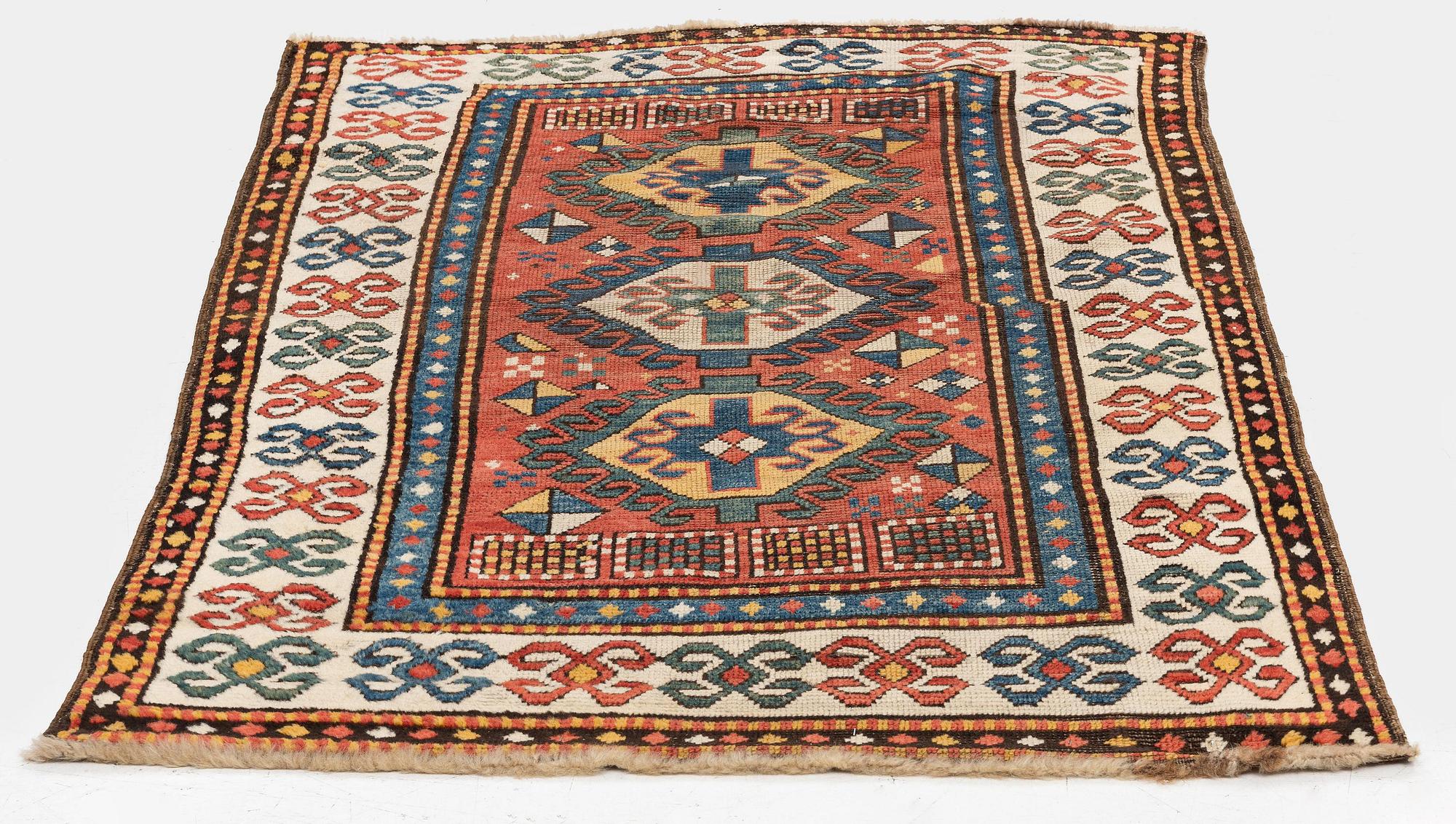 An antique Kazak rug, south Caucasus, c. 163 x 112 cm.