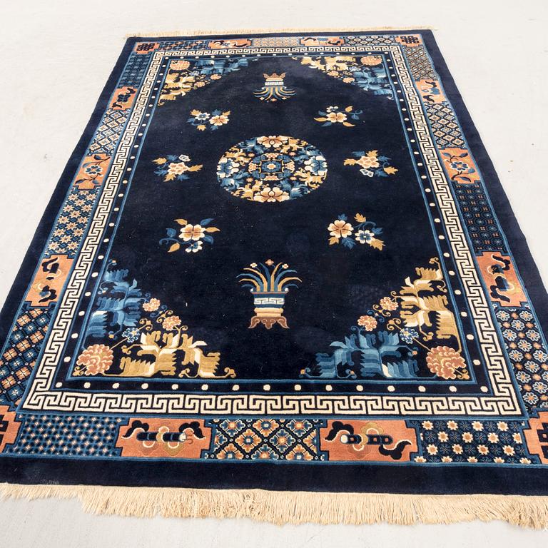 An old China carpet ca 274x183 cm.