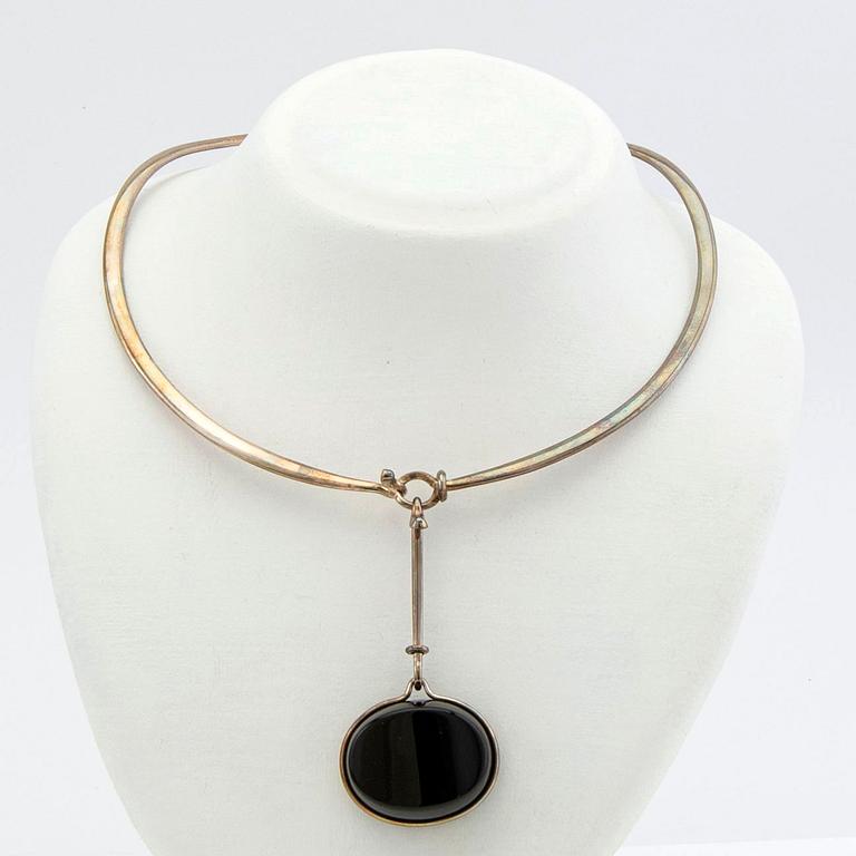 Vivianna Torun Bülow-Hübe, necklace, silver, with two pendants in rock crystal and onyx, by Georg Jensen.