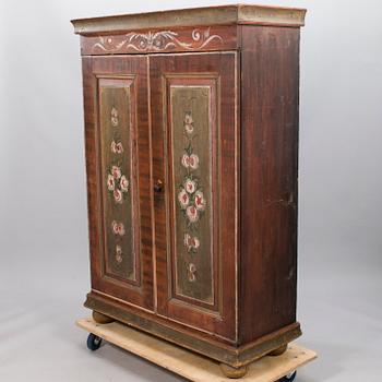 A painted cabinet, early 19th century.