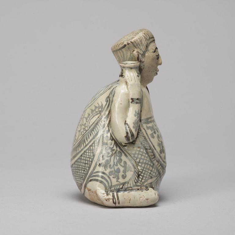 A Sawankhalok figurine/joss stick holder, 15th/16th Century.