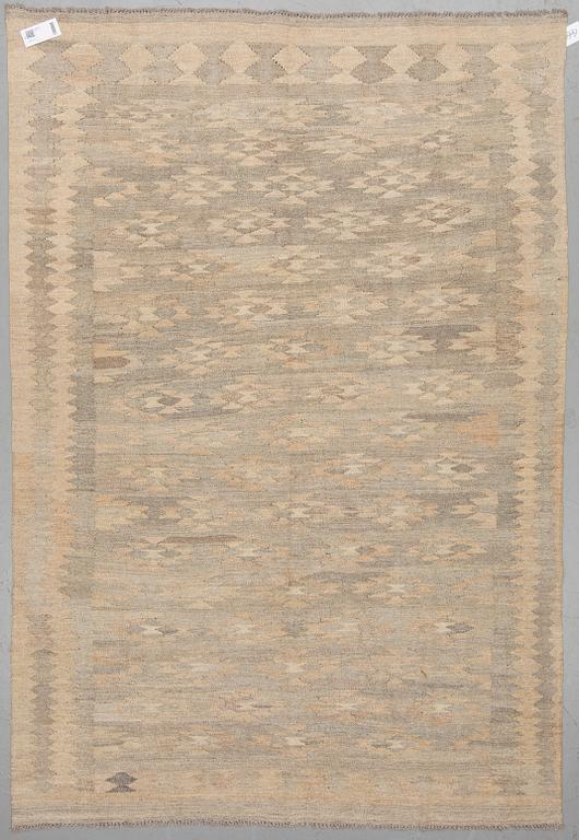 A kilim rug 228 x 158 cm.