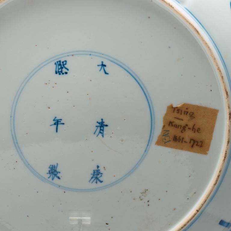A large blue and white deep dish, Qing dynasty, with Kangxi six character mark and period (1662-1722).