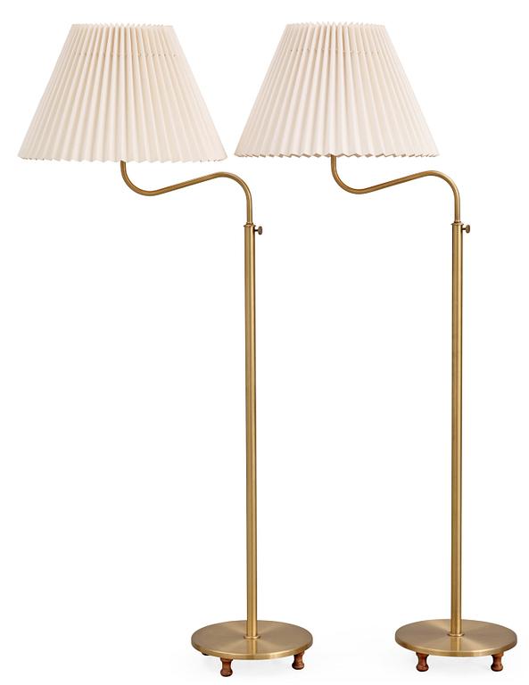 A pair of Josef Frank brass floor lamps, Svenskt Tenn, model 2568.