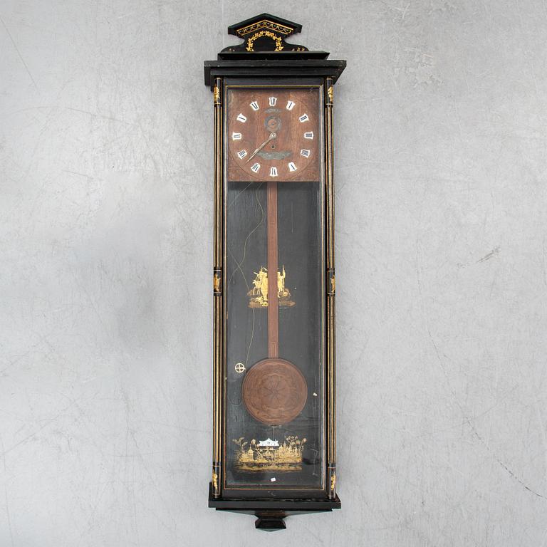 A lacquerwork wall pendulum clock, late 19th Century.