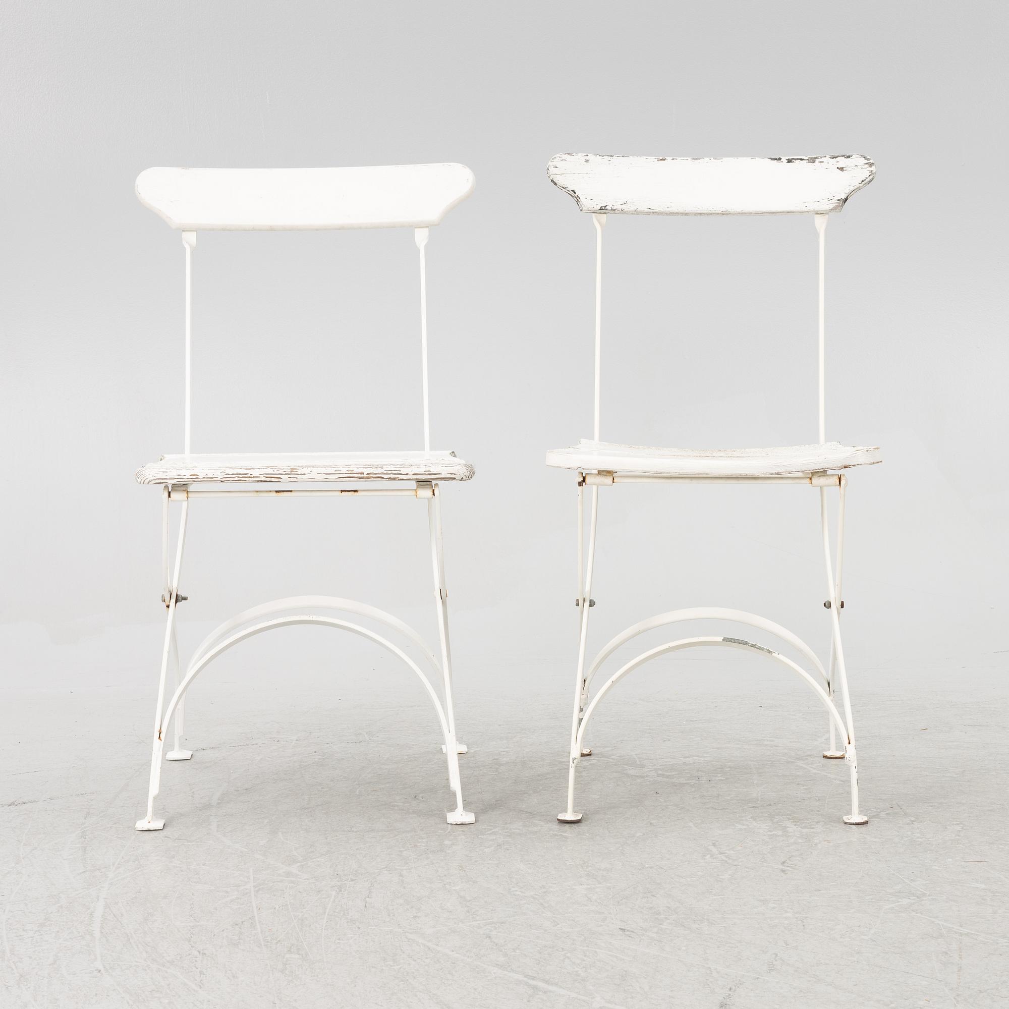 A set of seven garden chairs and two tables Byarums bruk, later part of the 20th century.