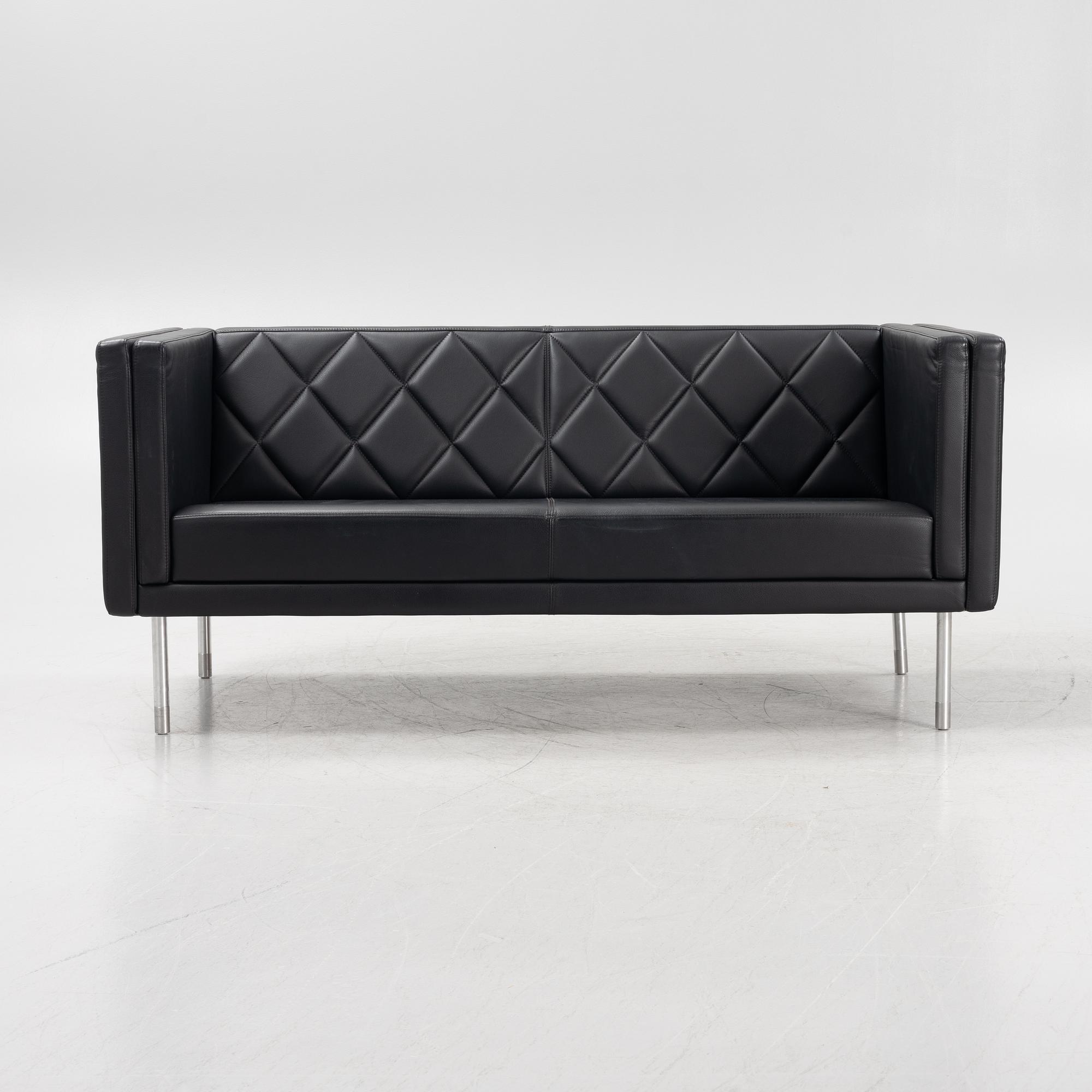 A leather upholstered sofa, 21st Century.