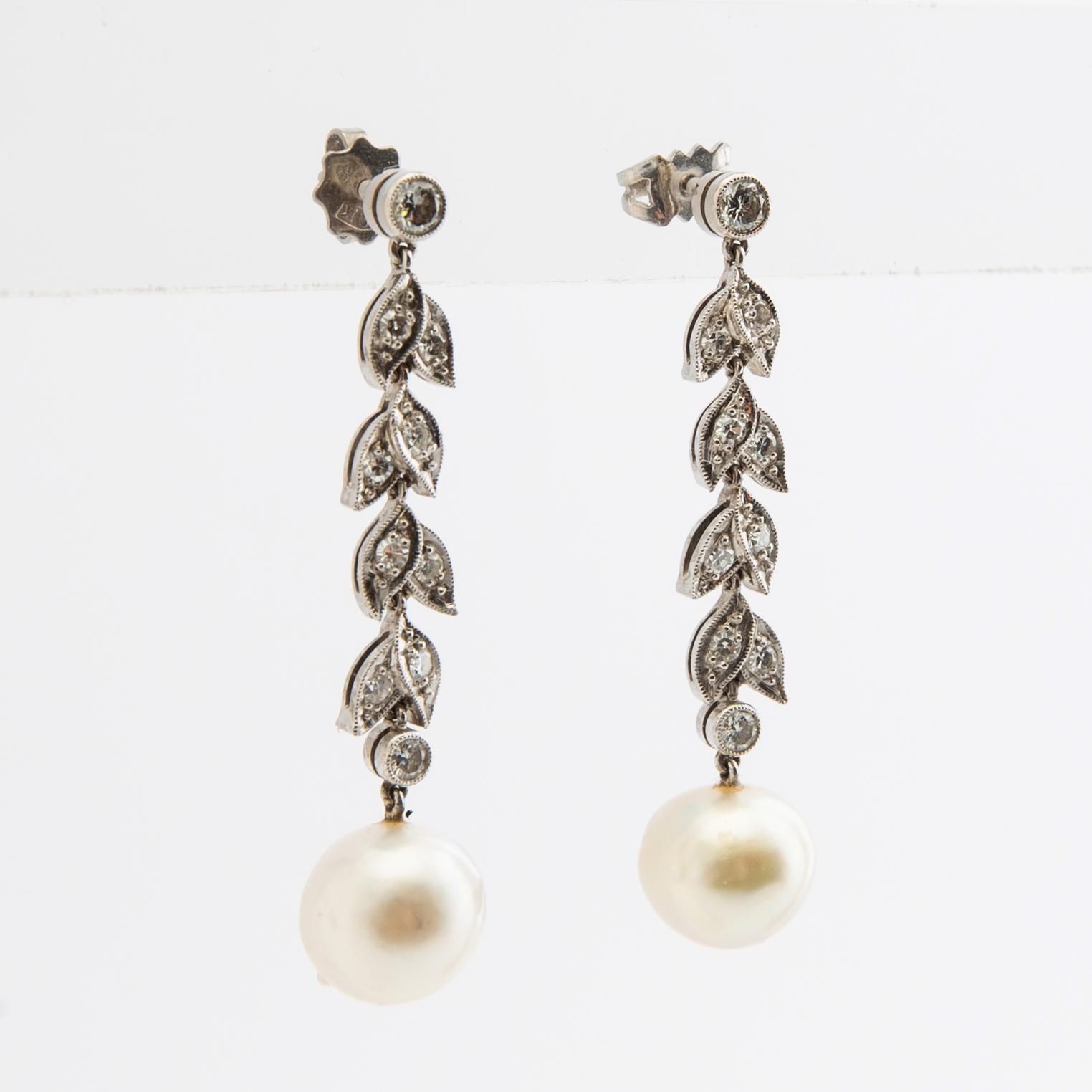 Earrings, a pair, 18k white gold with pearls and diamonds.