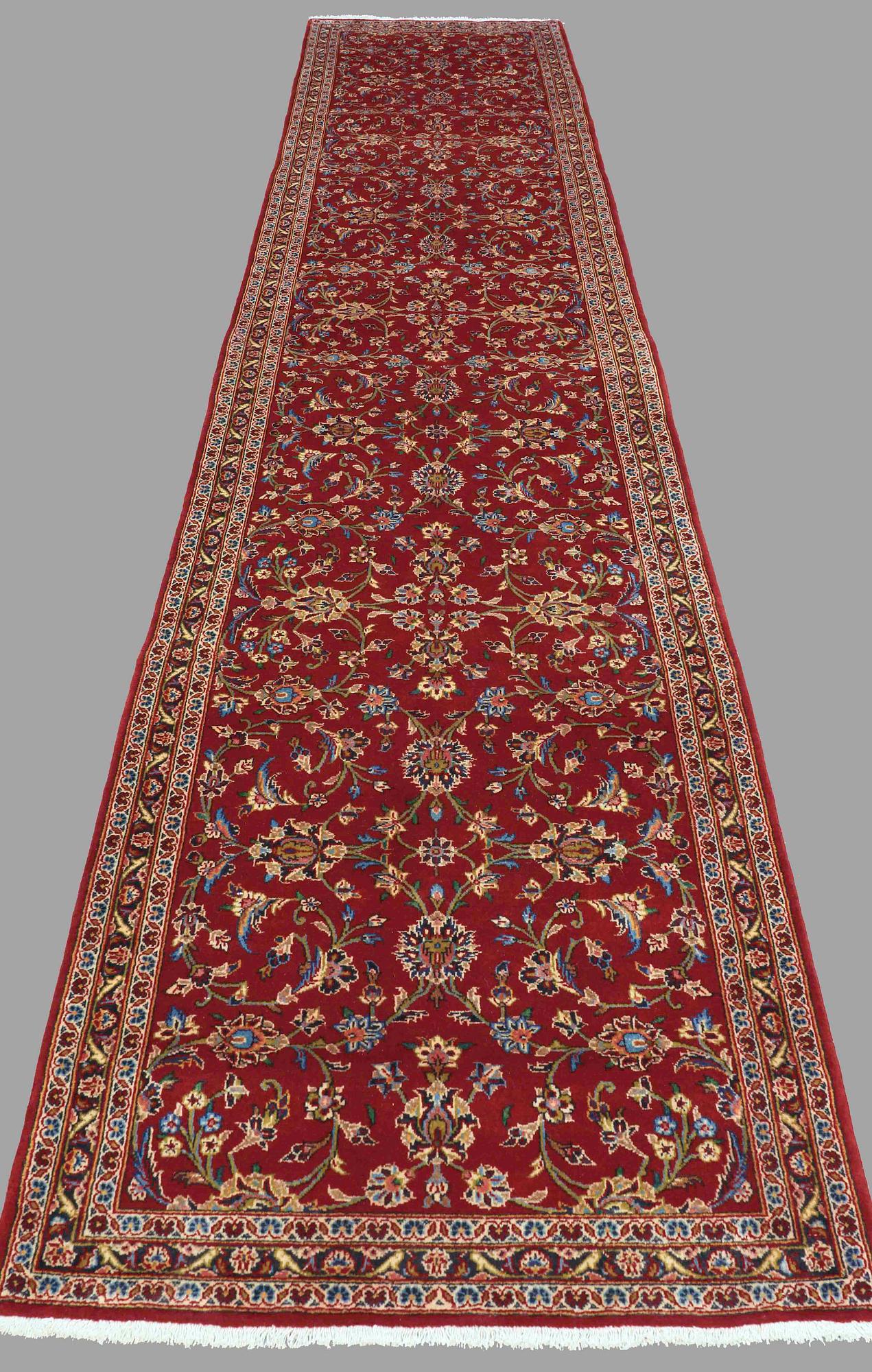 A runner from Kashan, around 500 x 93 cm.