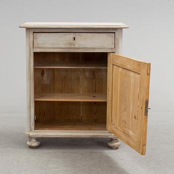 A cabinet, circa 1900.