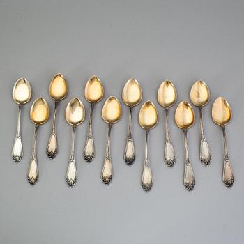 A set of 12 Fabergé parcel-gilt caviar-spoons, Moscow 1899-1908.