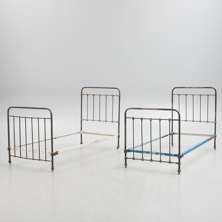 Two metal bed-frames from Nordiska Kompaniet, early 20th century.