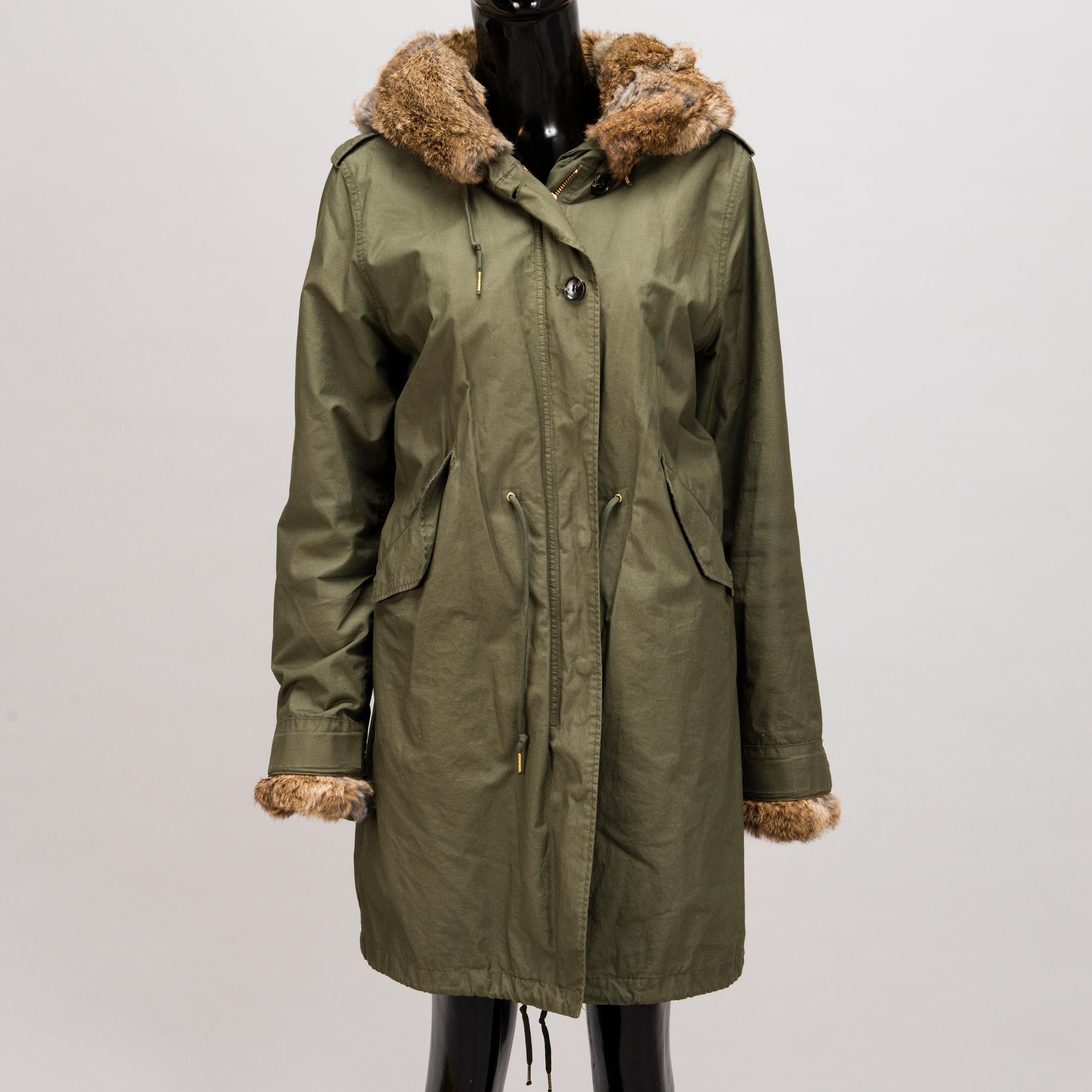 Ladies Woolrich Military Parka in size L.