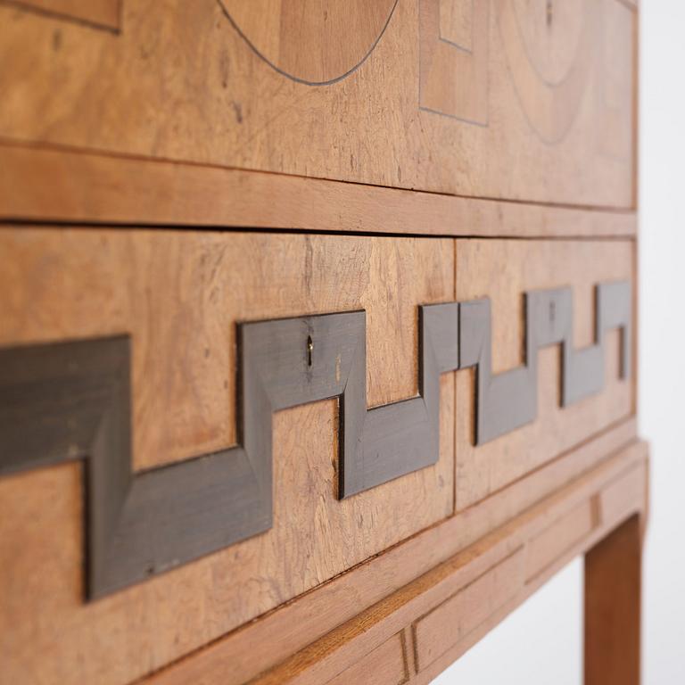 Carl Bergsten, an oak veneered sideboard/ chest of drawers, Nordiska Kompaniet Sweden 1923. Part of a set exhibited in Gothenburg 1923.