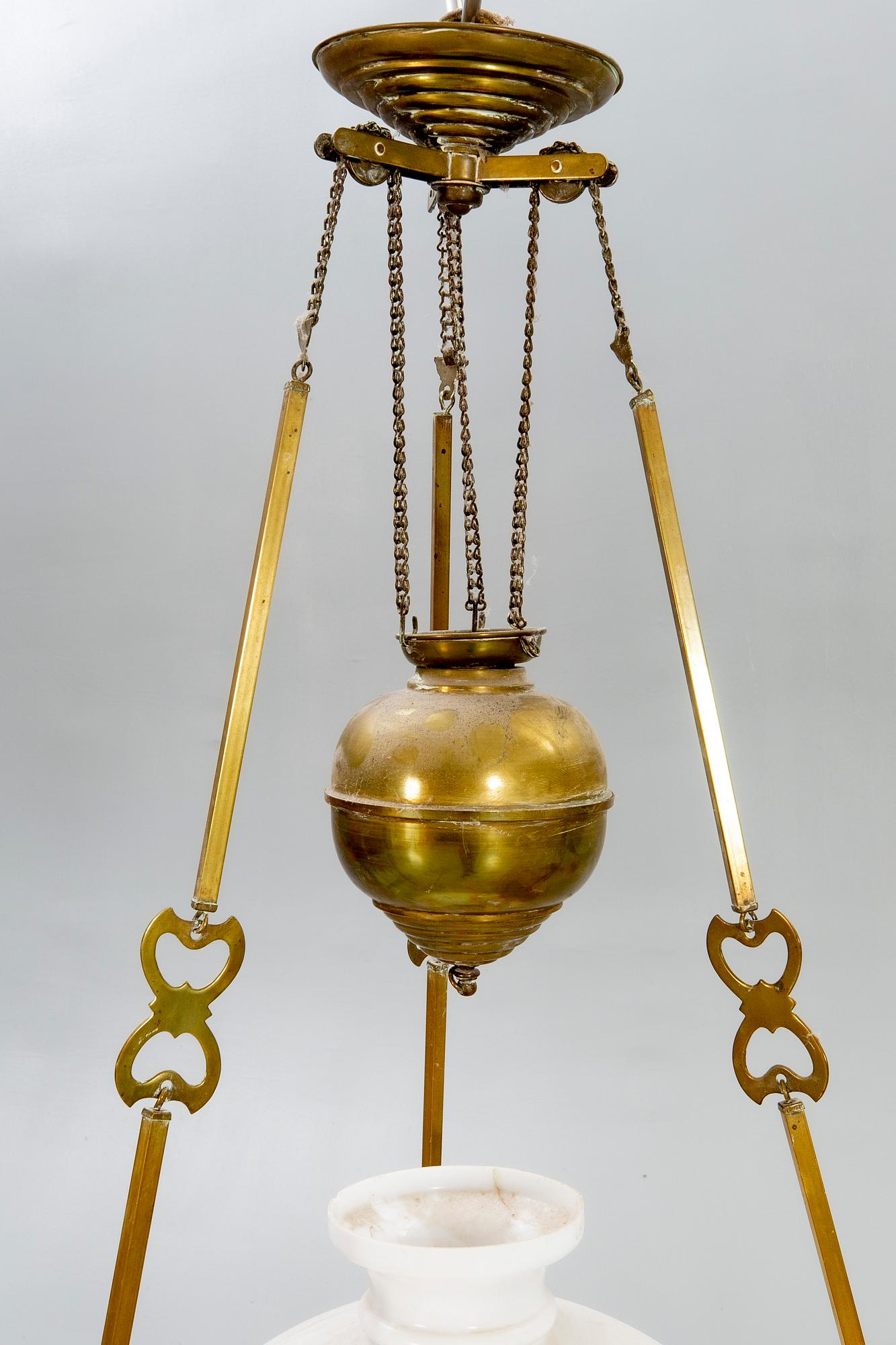 A Jugend brass celing paraffin lamp.